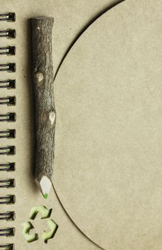 notebook and wooden pencil, conservation concept