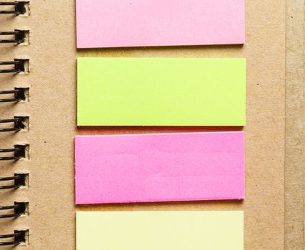colorful paper on notebook