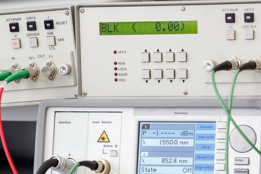 Modern fiber optic testing equipment - analyzer on white background