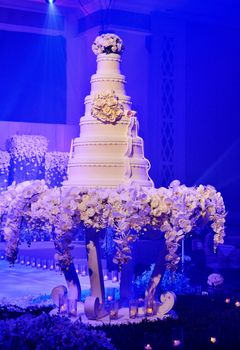 Wedding cake with flower decorate in wedding ceremony