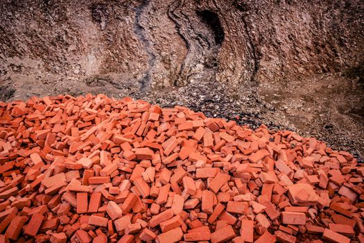 Pile of red bricks in a canyon