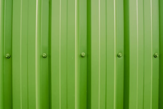 Colorful plastic wall with iron nuts