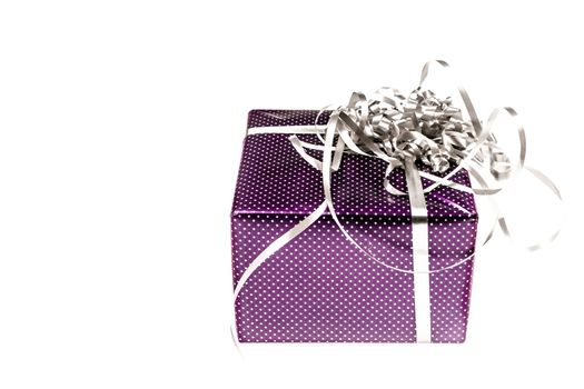Colorful gift box with silver ribbon 