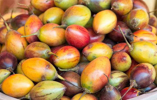 Heap of Tamarillo fruits on a open market