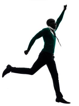 one african  black man  jumping happy  in silhouette studio on white background