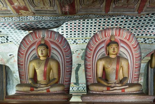 Ancient Buddha statue images in Dambulla Rock Temple caves, Sri Lanka 