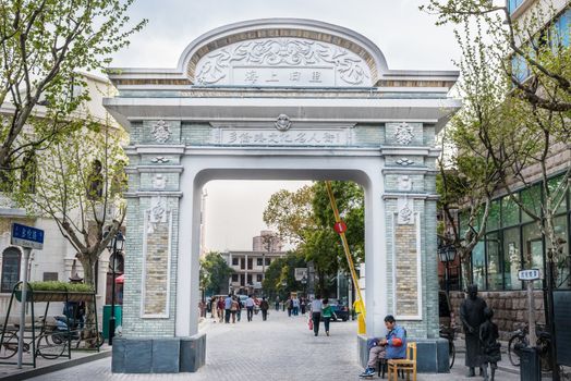 Shanghai, China - April 7, 2013: historic entrance gate of the pedestrian way of duolon road  at the city of Shanghai in China on april 7th, 2013