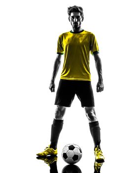 one brazilian soccer football player young man standing defiance  in silhouette studio  on white background