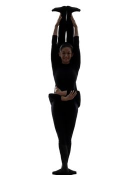 two women contortionist practicing gymnastic yoga in silhouette   on white background