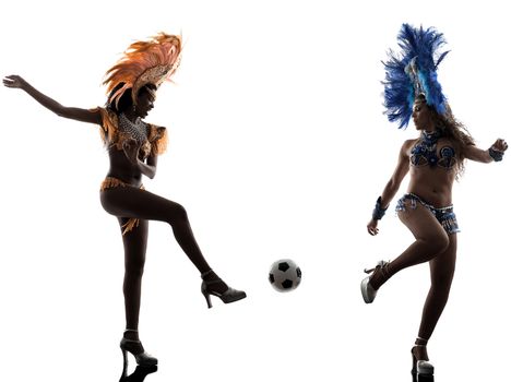 two women samba dancer  playing soccer  silhouette  on white background