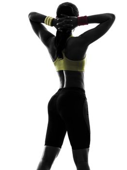 one  woman exercising fitness workout arms behind head  rear view in silhouette  on white background