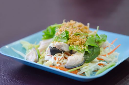 steamed fish with fried garlic and fresh vegetable