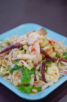 spicy seafood  salad  with  boiled shrimp , lemongrass , fried chili  and fresh vegetable