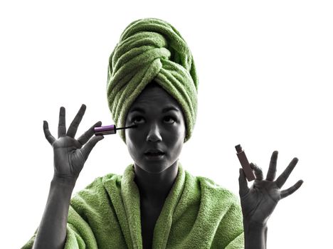 one  woman mascara brush in silhouette  on white background