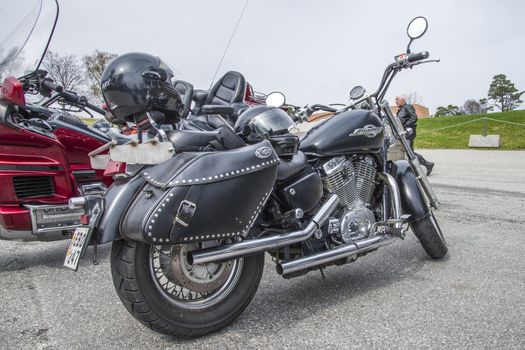 Every year in May there is a motorcycle meeting at Fredriksten fortress in Halden, Norway. In this photo several bikes lined up