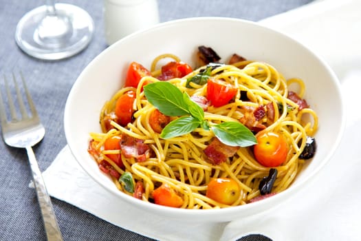 Spaghetti with bacon,tomato and dried chilli