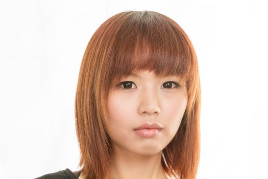 Asian female with sad expression on her face