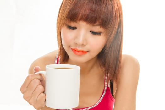 Chinese female with white coffee cup