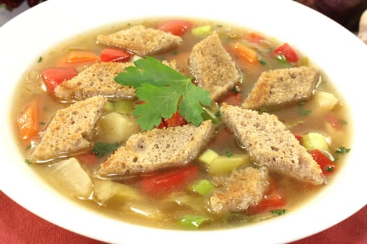 a plate with a colorful bread soup