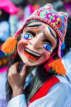 Pisac, Peru - July 16, 2013: man dancer portrait at Virgen del Carmen parade in the peruvian Andes at Pisac Peru on july 16th, 2013