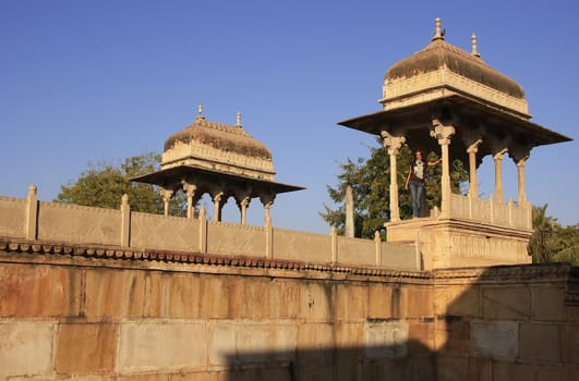 Young woman standing at Raniji ki Baori, Bundi, Rajasthan, India