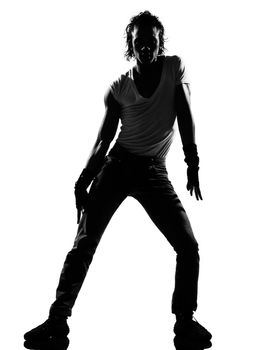 full length silhouette of a young man dancer dancing funky hip hop r&b on  isolated  studio white background