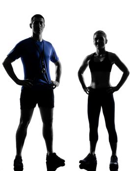 couple woman man exercising workout fitness aerobics instructors posture in silhouette studio isolated on white background