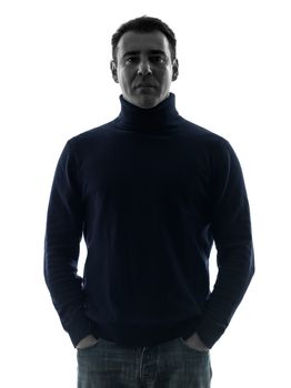 one caucasian man mature serious portrait in silhouette studio isolated on white background