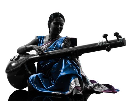 one indian tempura musician woman in silhouette studio isolated on white background