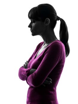 one caucasian woman thinking sadness in silhouette studio isolated on white background