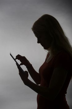 young blond woman with tablet pc