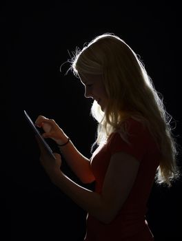 happy young woman with digital tablet