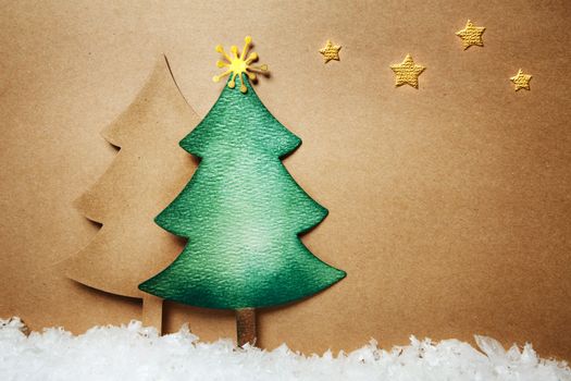 Handmade paper craft Christmas tree and snow with stars