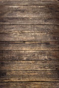 The Background of old brown worn wooden planks