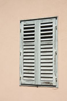 A window with shutters