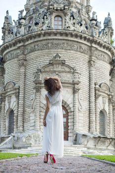 Sexy woman in white long dress
