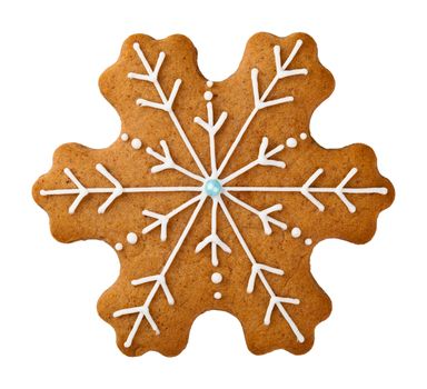 Gingerbread cookie in snowflake shape isolated on white background