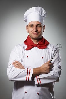 Male chef portrait against grey background