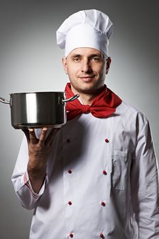 Male chef portrait against grey background