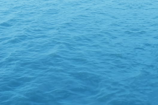 In the open tropical sea , blue water surface