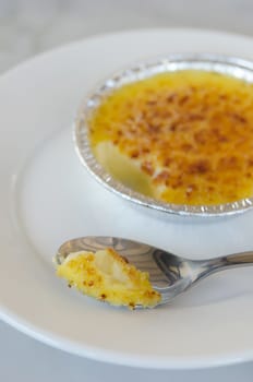  French dessert - creme brulee , Sweet caramelized custard , ( selective focus )