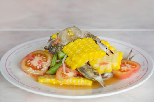 sweet corn  spicy salad with raw crab on dish , asian food