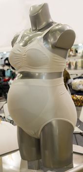 Bandage for the pregnant woman in the shop of future mothers