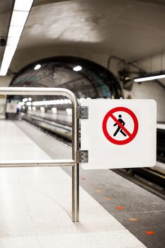 Safety Interdiction Sign (Do not Cross) on a Underground Subway Platform