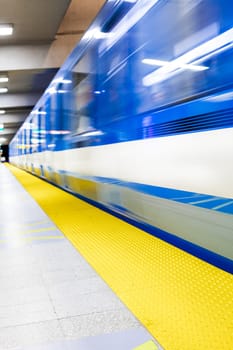 Colorful Underground Subway Train and Platform with motion blur