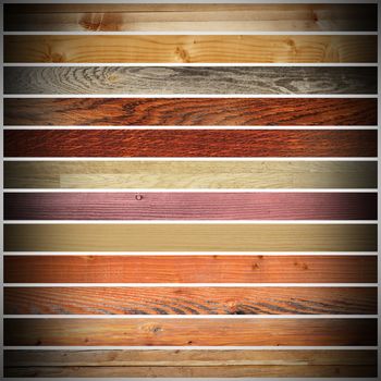 large collection of different wooden planks for parquet design