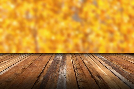 vintage wooden terrace with view to the beautiful forest in fall background
