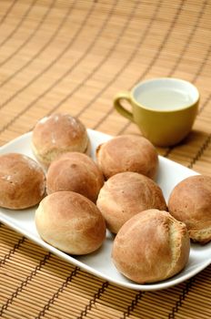 Round bread with tea cup