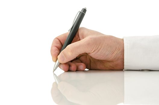 Detail of businessman hand writing. Isolated over white background.