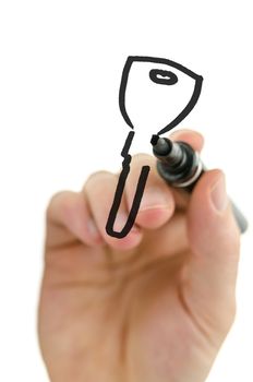 Male hand drawing house key with black marker on virtual whiteboard.